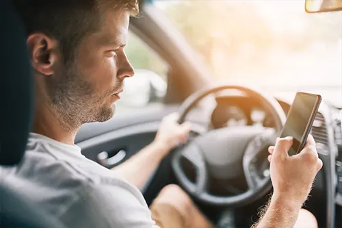 Distracted Driving Accidents: Missouri Laws and Liability